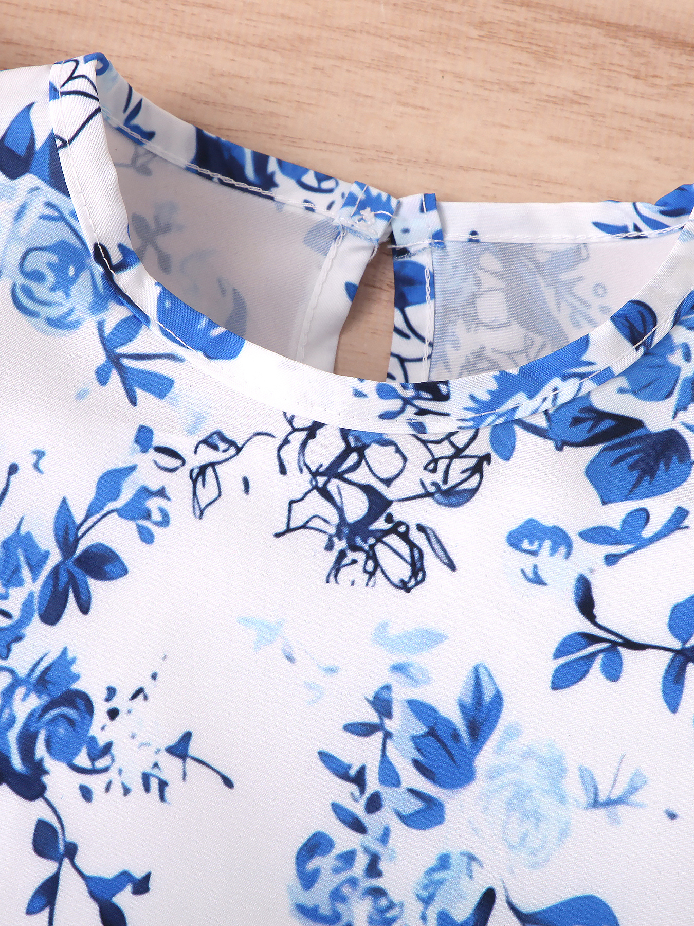 Blue - and - White Floral Flutter - Sleeve Top with Blue Tie - Waist Shorts Girls' Set