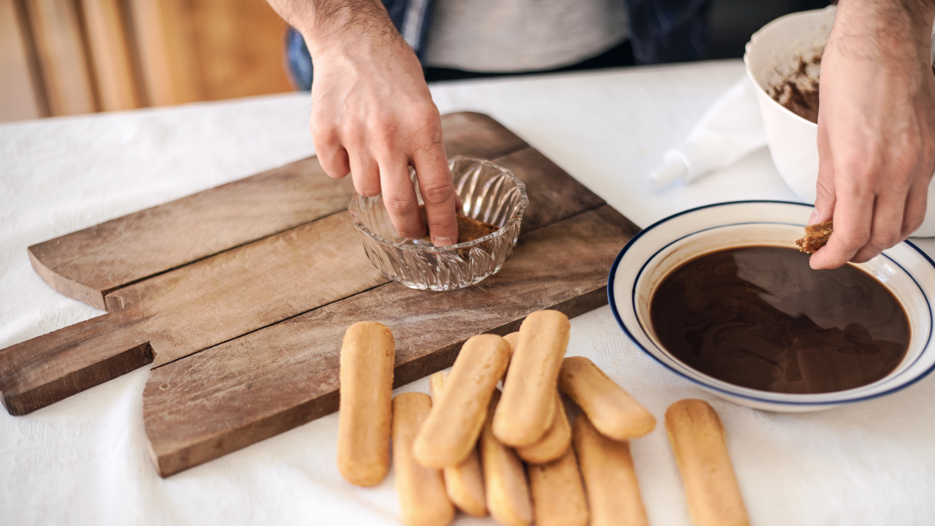 Dip ladyfinger into berry juice