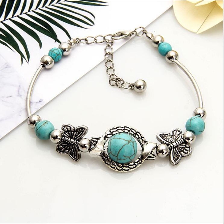 Green Turquoise The butterfly of carve patterns or designs on woodwork Bracelet