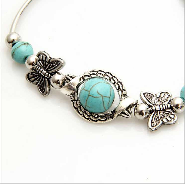 Green Turquoise The butterfly of carve patterns or designs on woodwork Bracelet