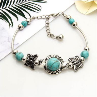 Green Turquoise The butterfly of carve patterns or designs on woodwork Bracelet