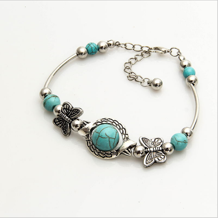 Green Turquoise The butterfly of carve patterns or designs on woodwork Bracelet