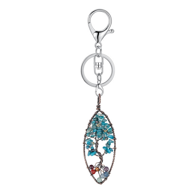 Seven chakra reiki tree life is hand-wrapped with a bronze wire horse eye shaped natural sapphire gravel key chain
