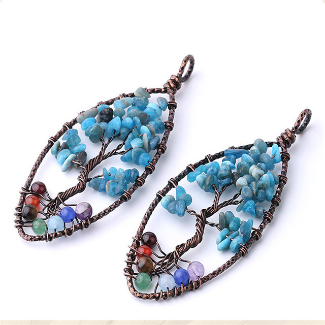 Seven chakra reiki tree life is hand-wrapped with a bronze wire horse eye shaped natural sapphire gravel key chain