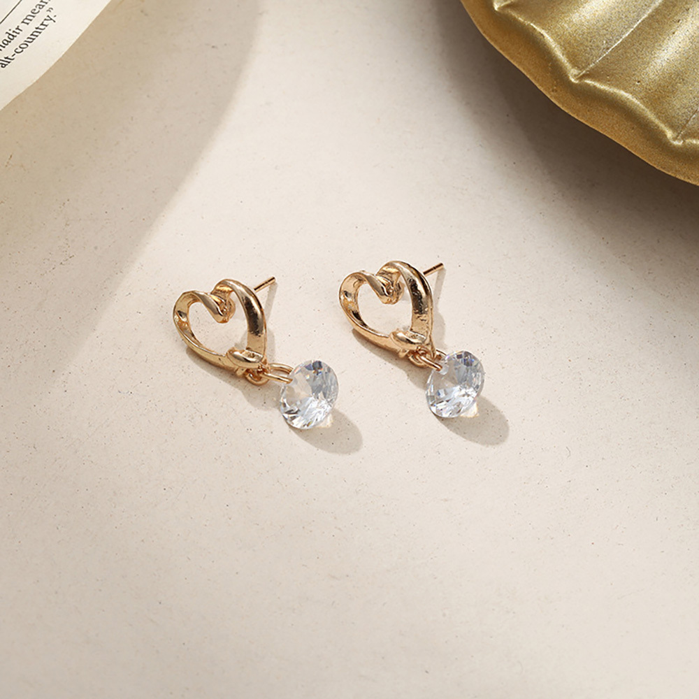 Elegant hollow heart zircon stud earrings for girls