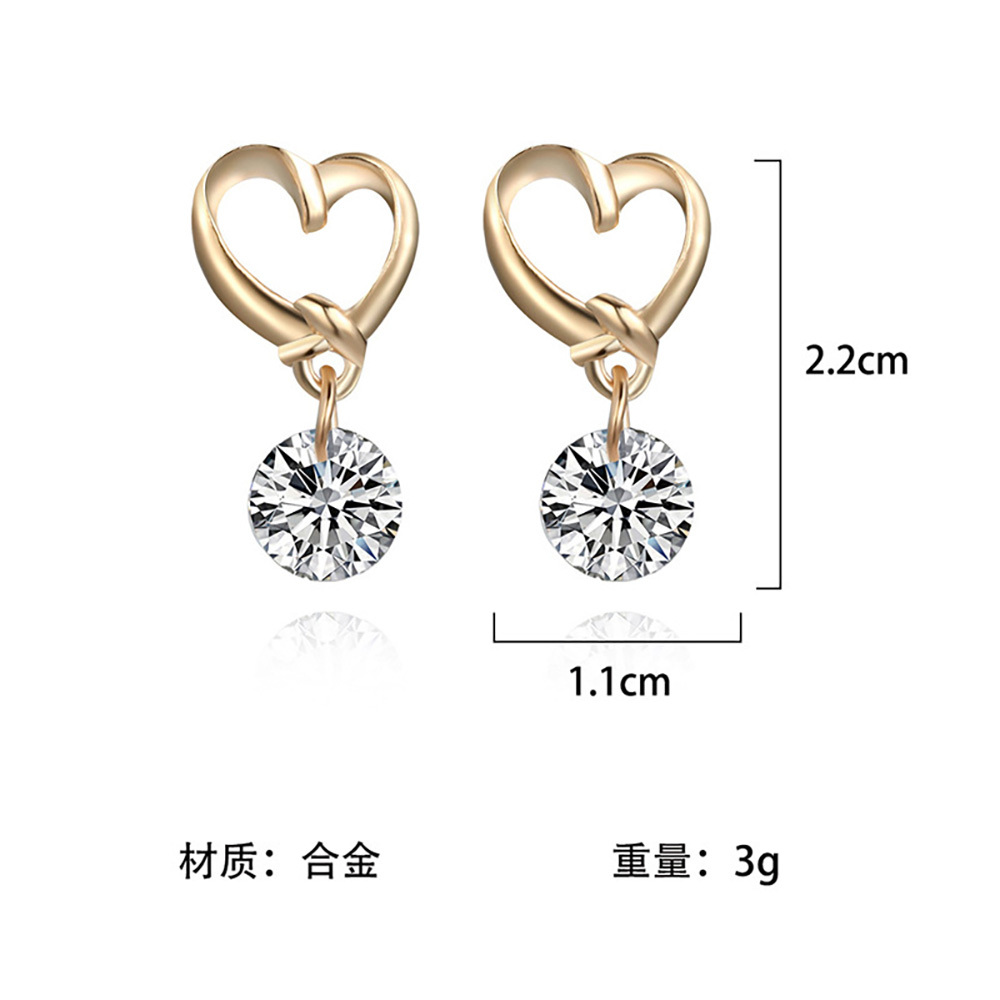 Elegant hollow heart zircon stud earrings for girls