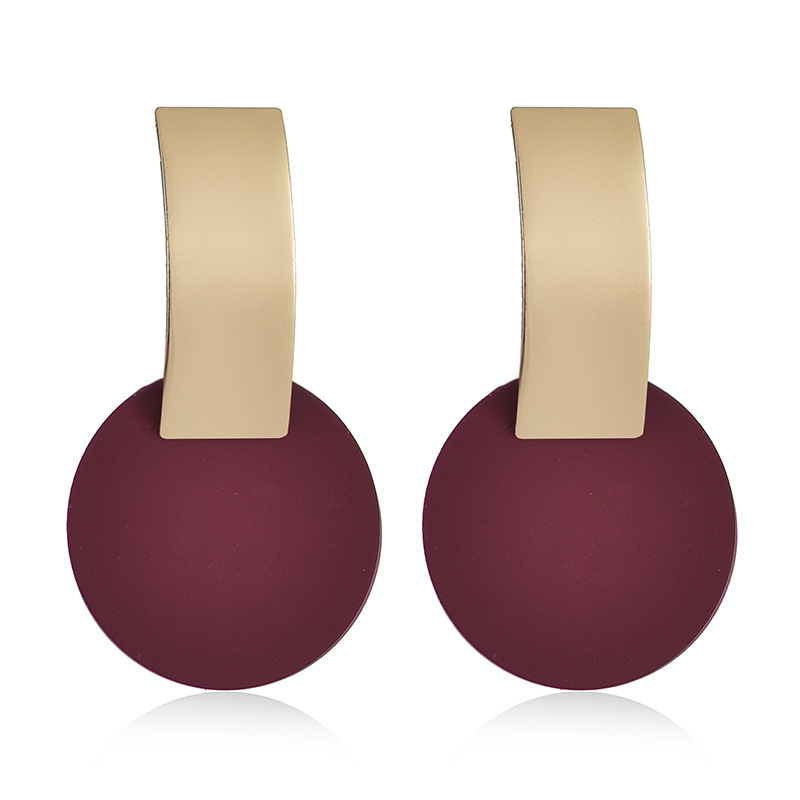 Fashionable asymmetrical size round metal earrings with personalized studs