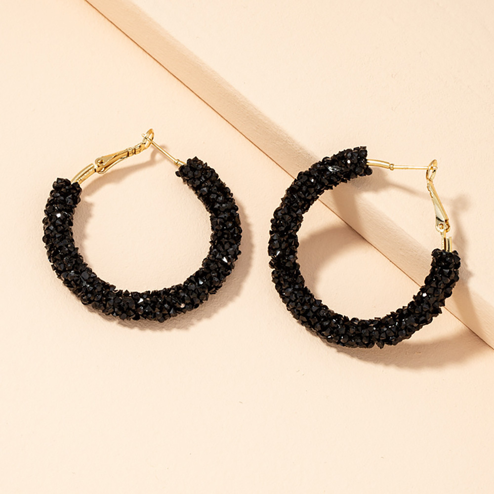 Simple geometric black diamond-encrusted circle earrings