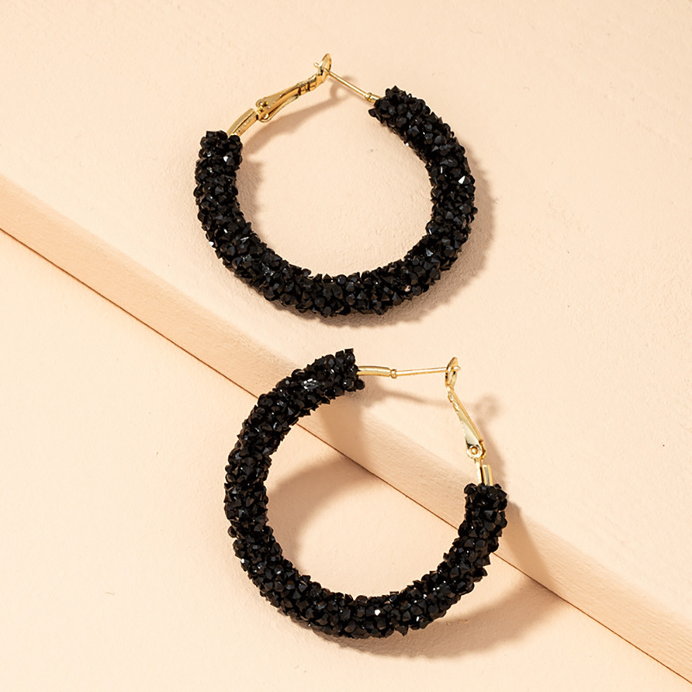 Simple geometric black diamond-encrusted circle earrings