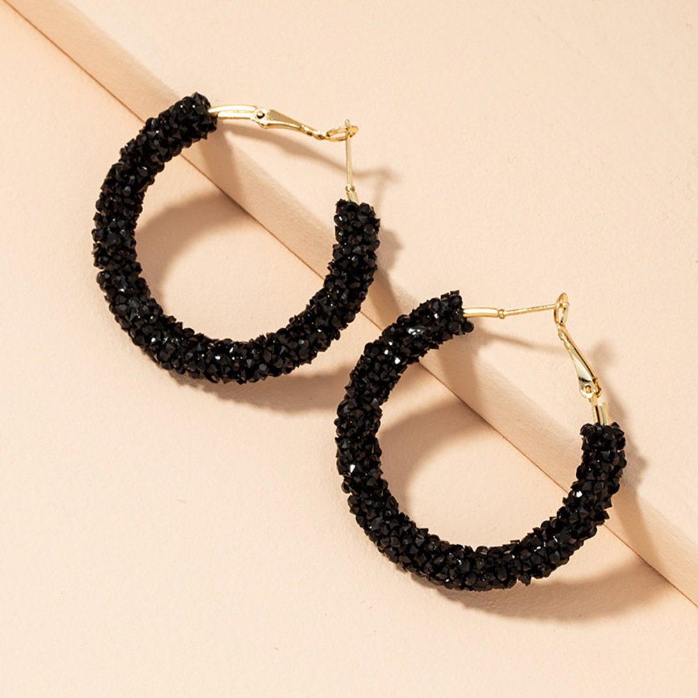 Simple geometric black diamond-encrusted circle earrings