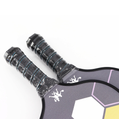 Durable pickleball paddle with shock absorbing carbon fiber 