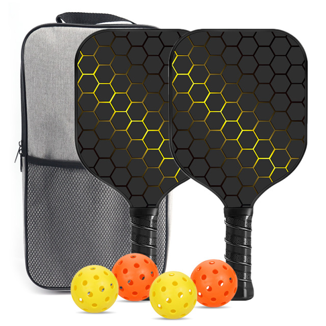Adult pickleball paddle with carbon fiber face and polymer honeycomb core