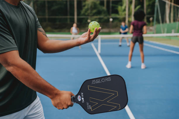 Melors factory-made pickleball paddles with textured face, ready for professional cleaning