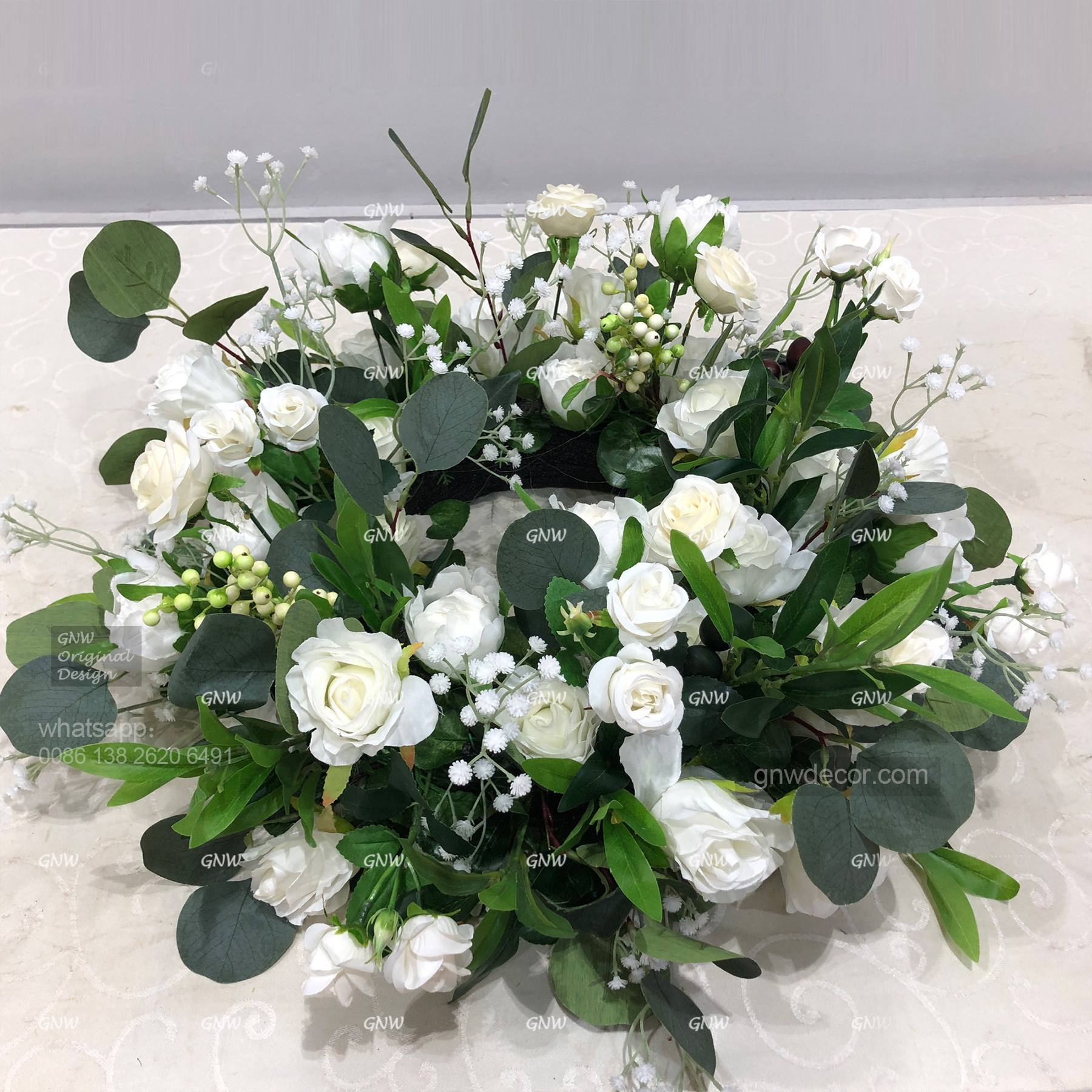 Artificial flower wreath