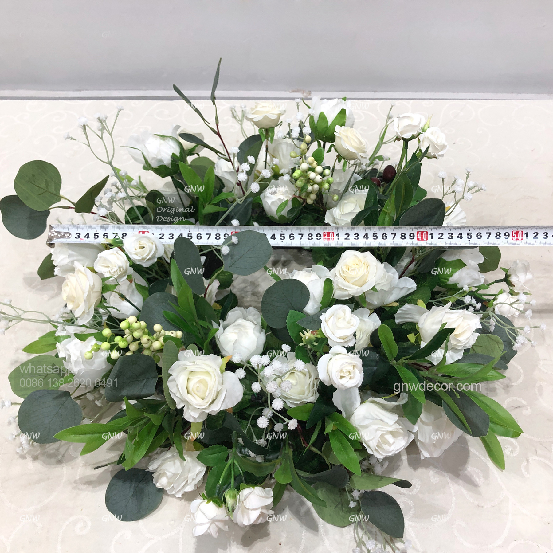 Artificial flower wreath