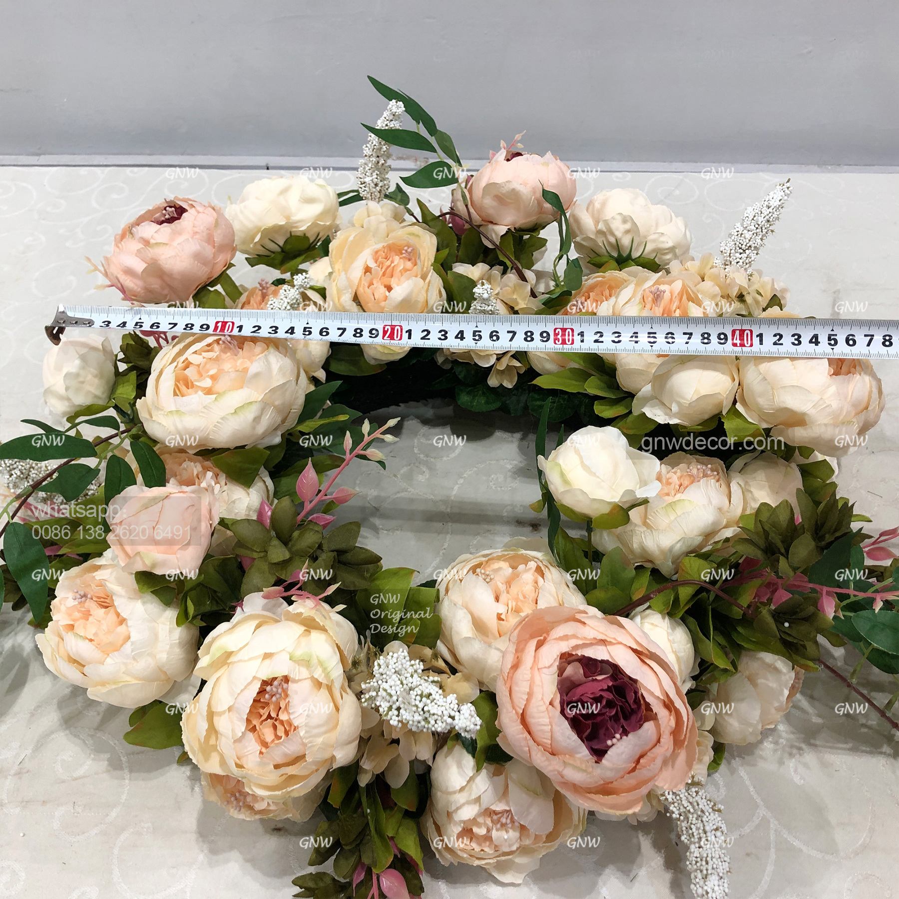Artificial flower wreath