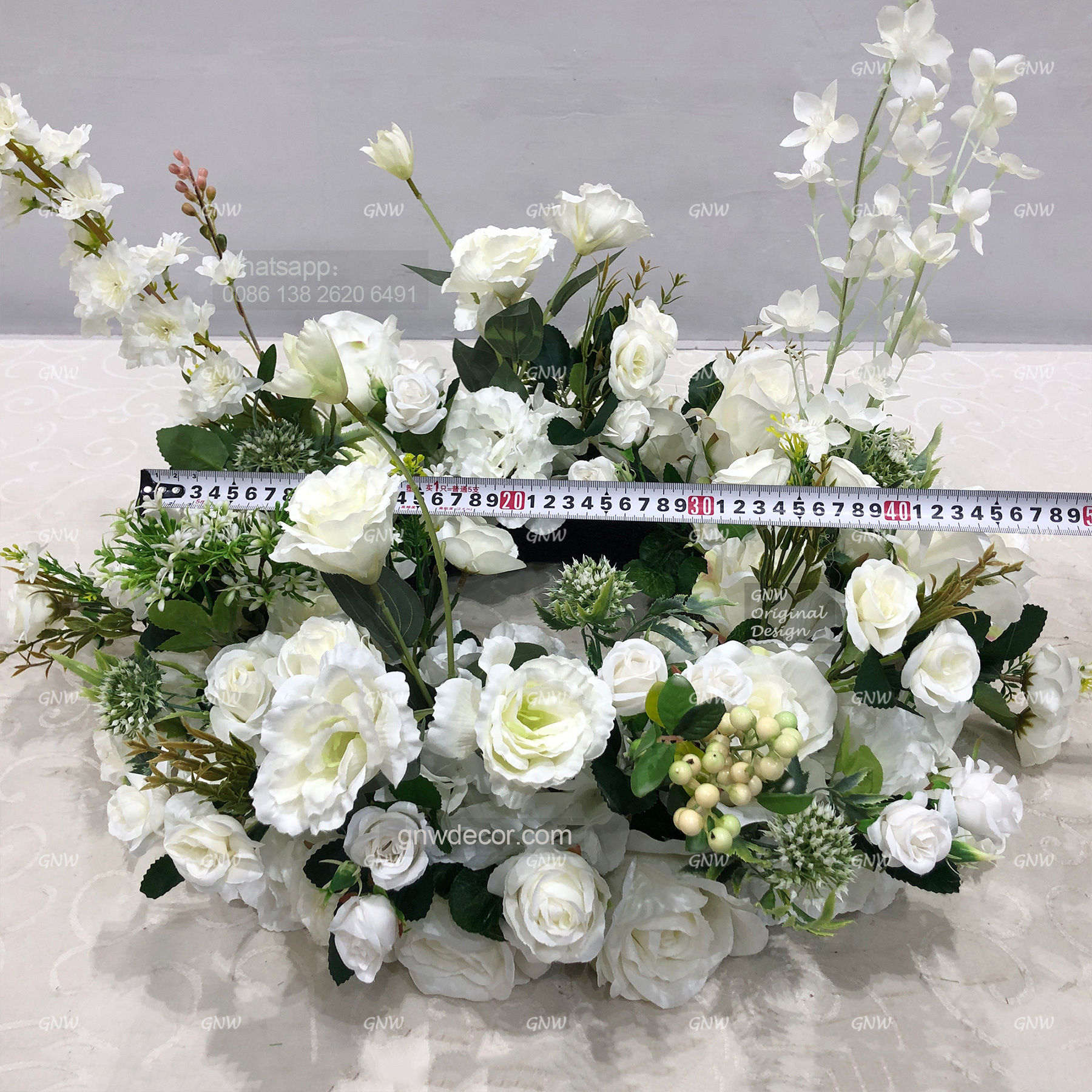 Artificial flower wreath