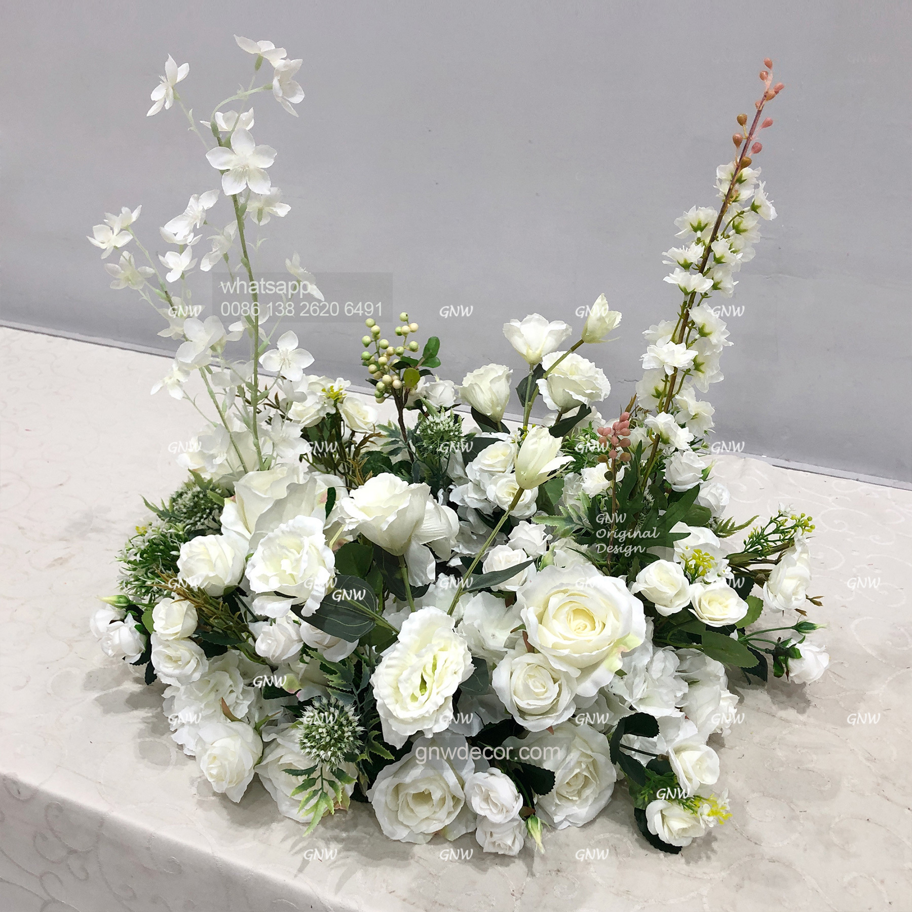 Artificial flower wreath