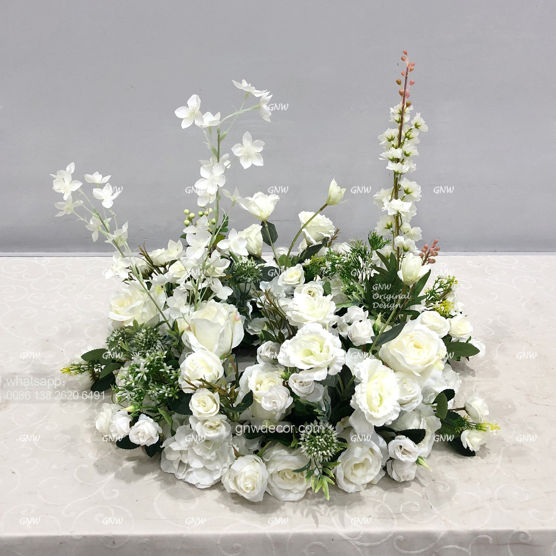Artificial flower wreath