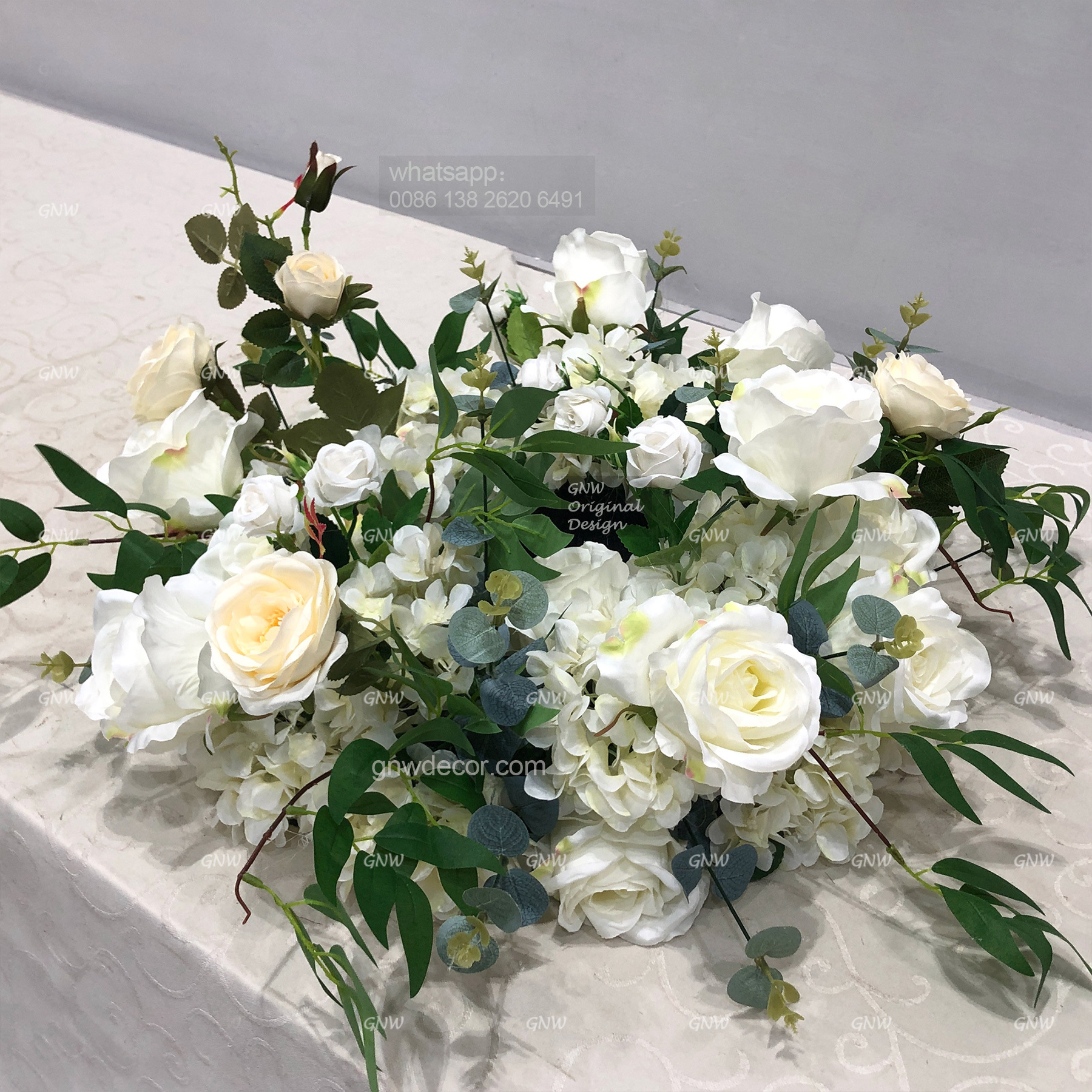Artificial flower wreath