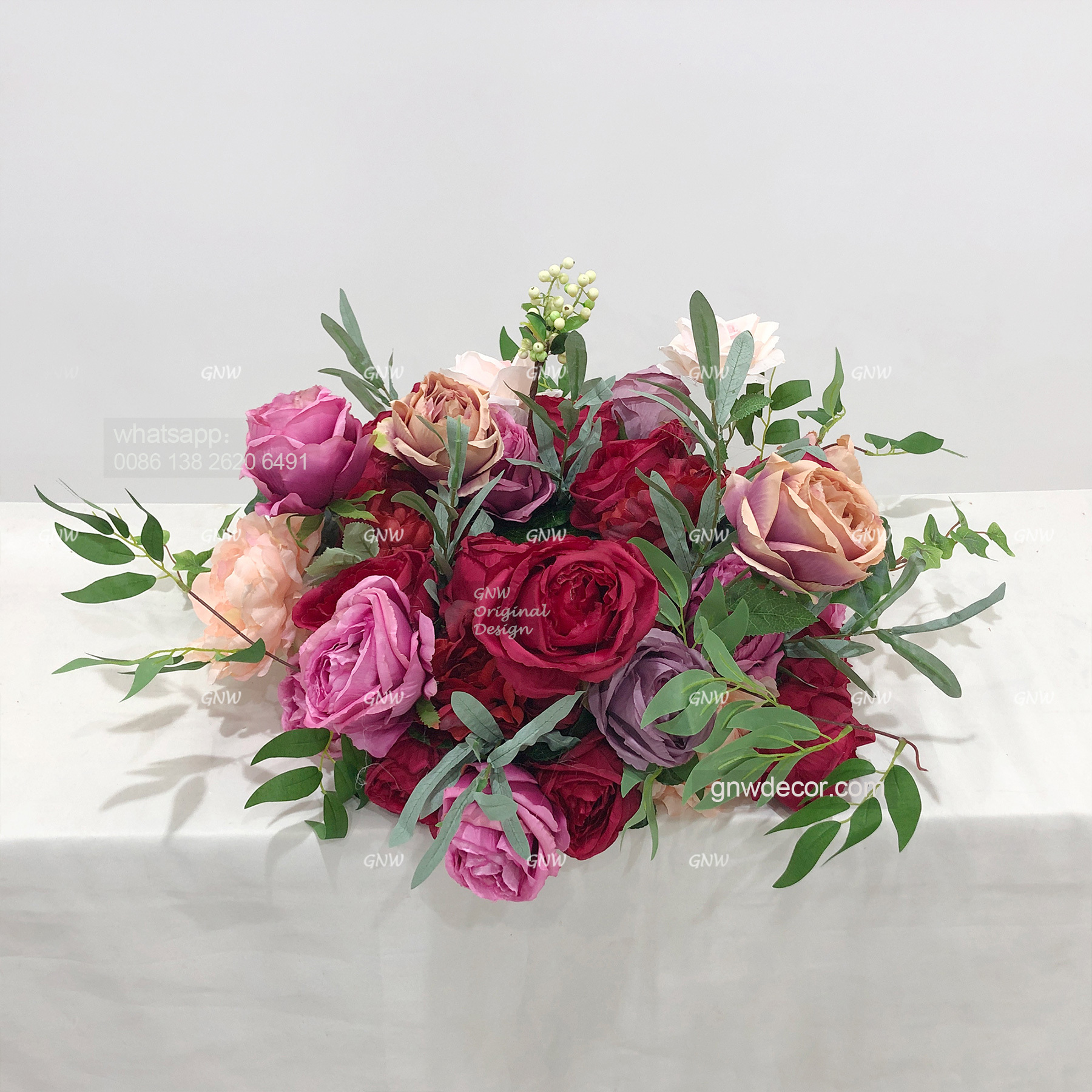 Artificial flower wreath
