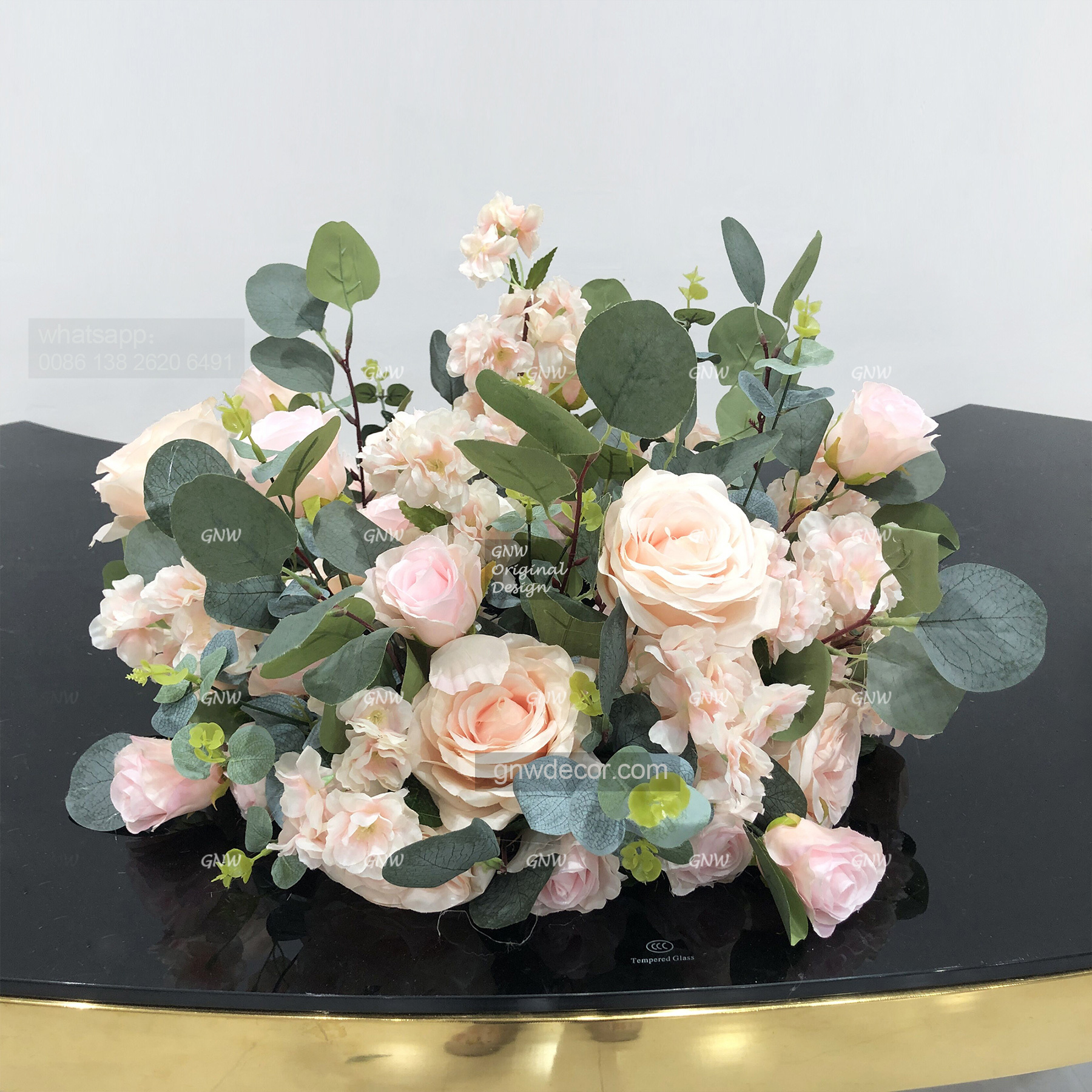 Artificial flower wreath