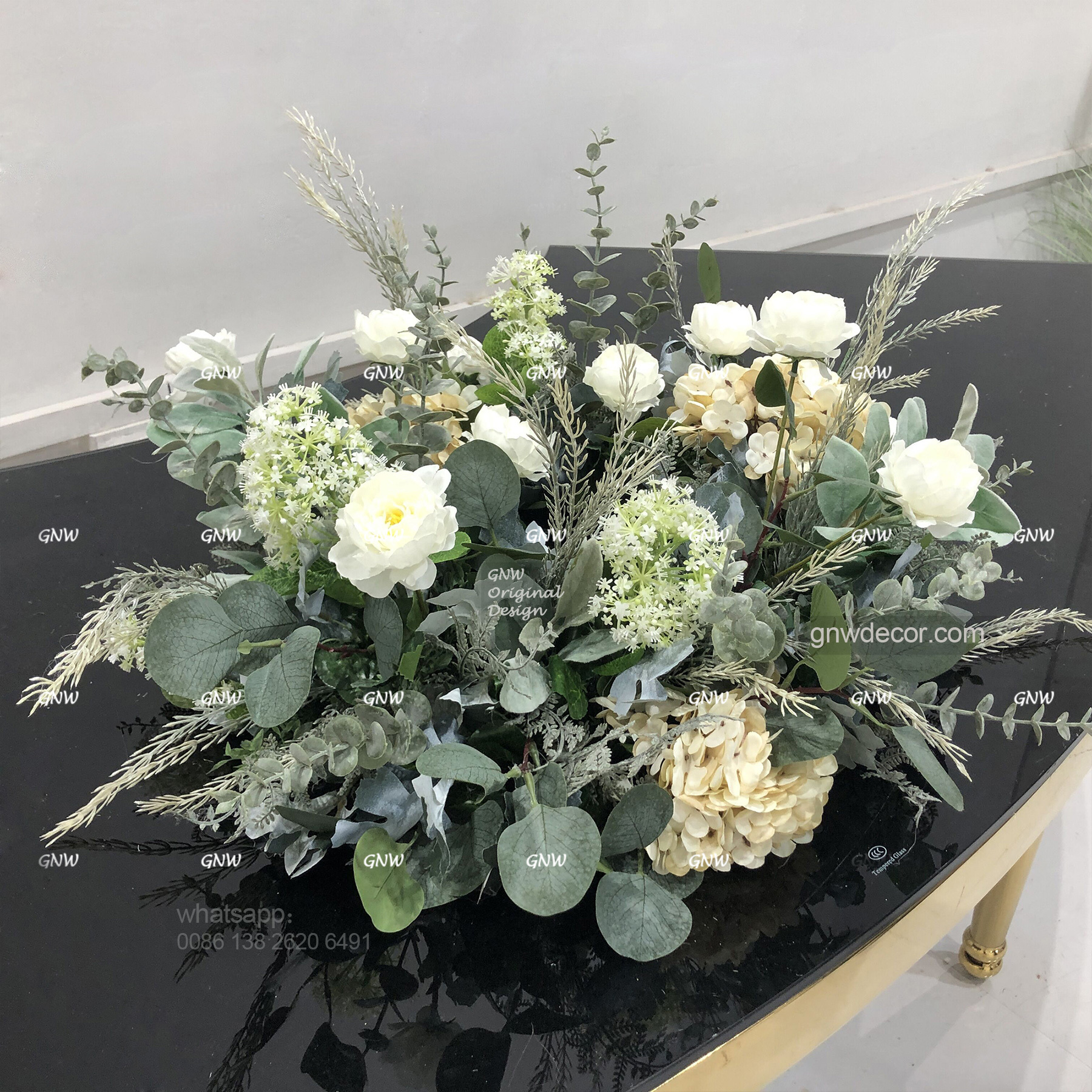 Artificial flower wreath