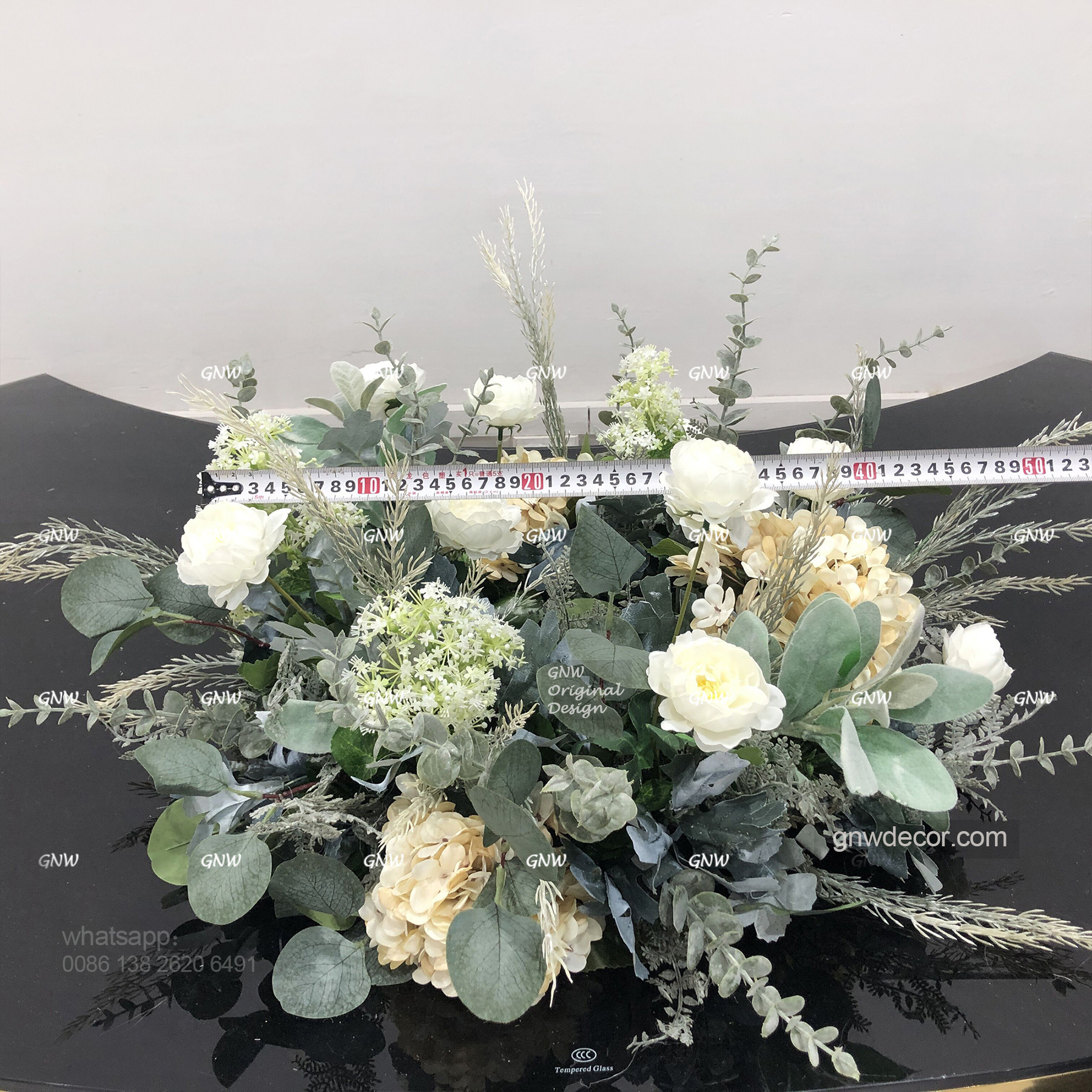 Artificial flower wreath