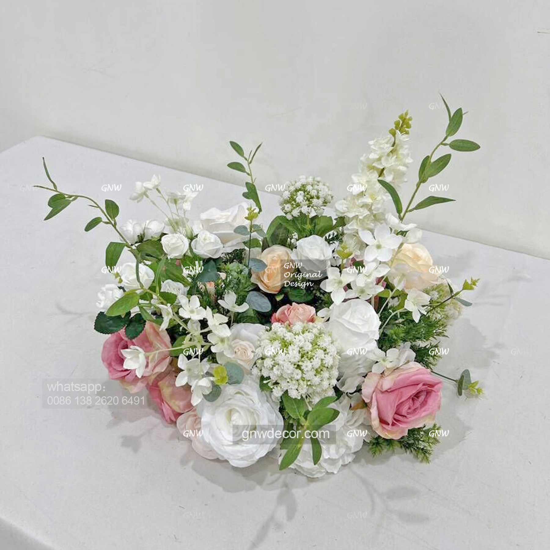 Artificial flower wreath