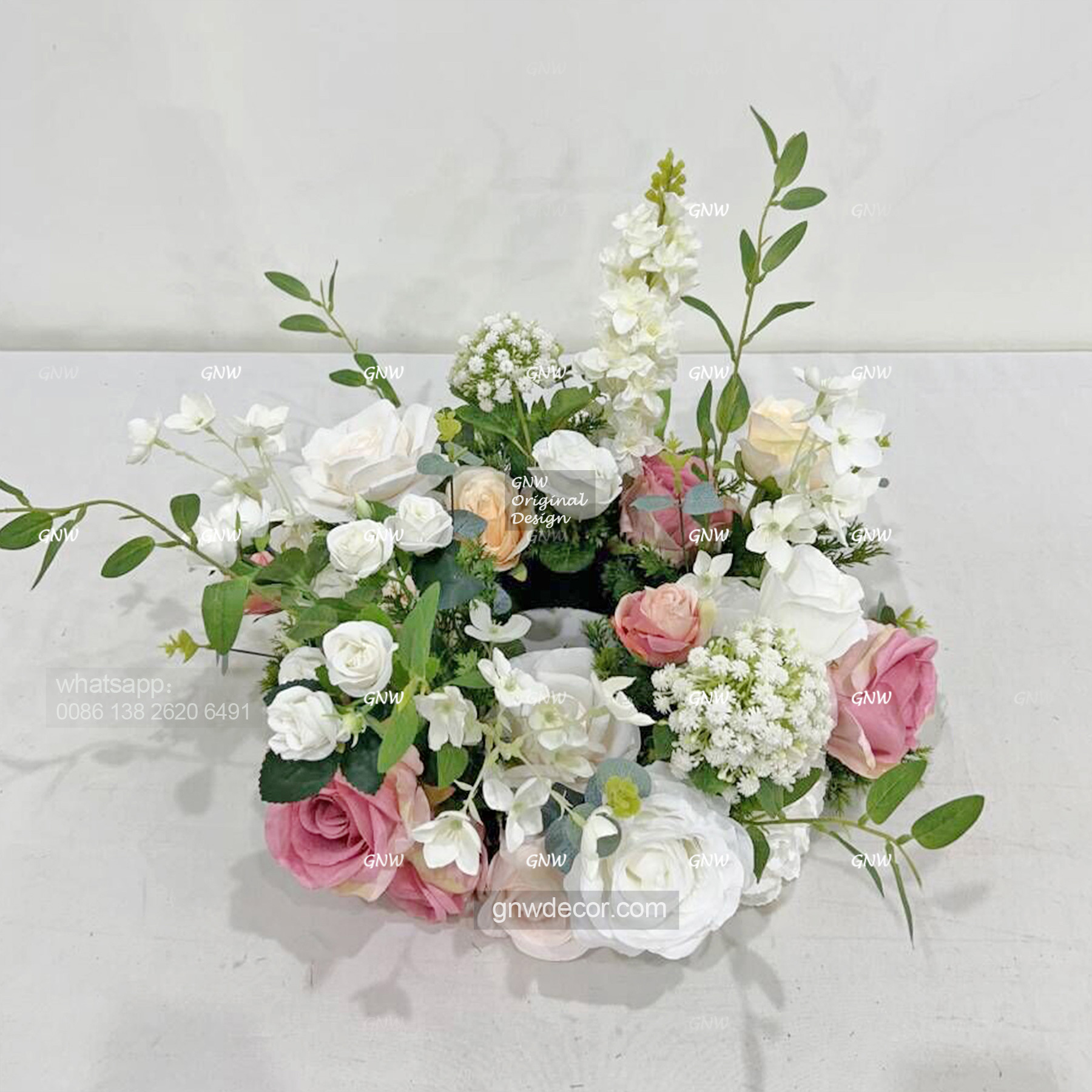 Artificial flower wreath