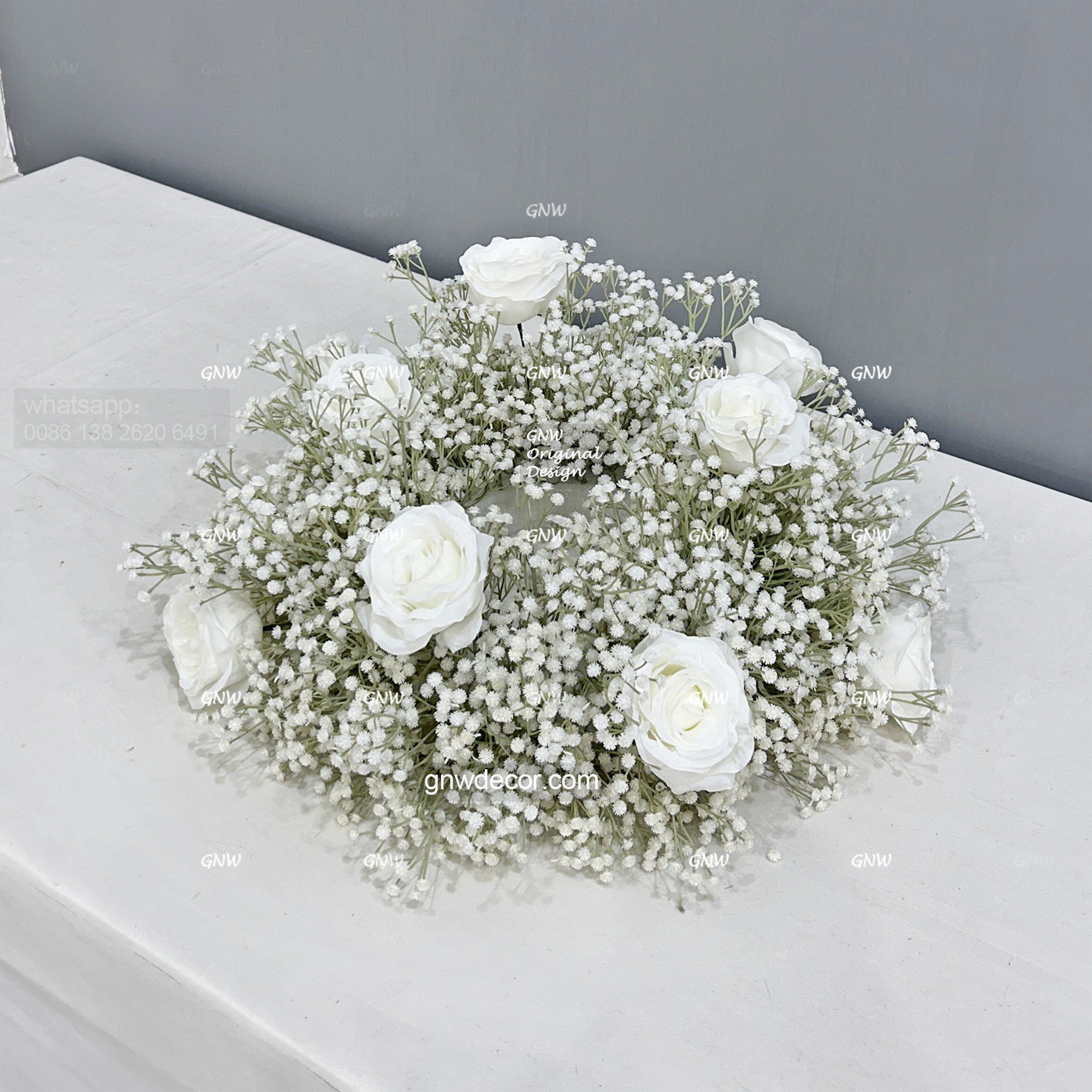 Artificial flower wreath