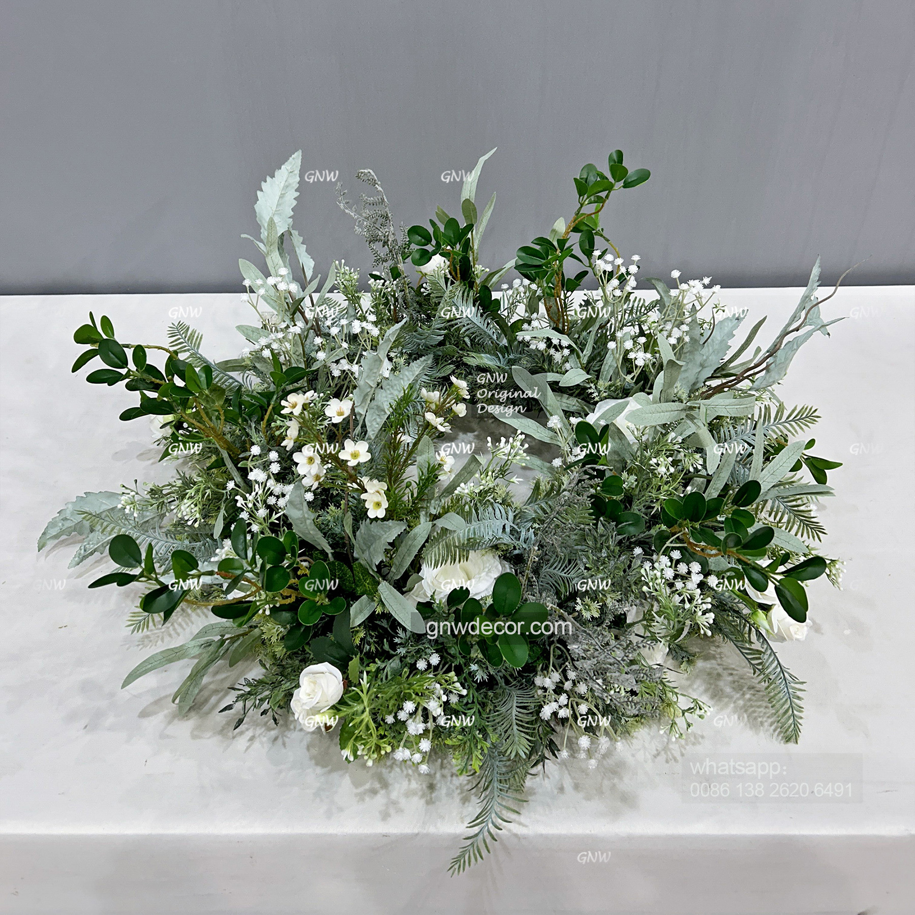 Artificial flower wreath
