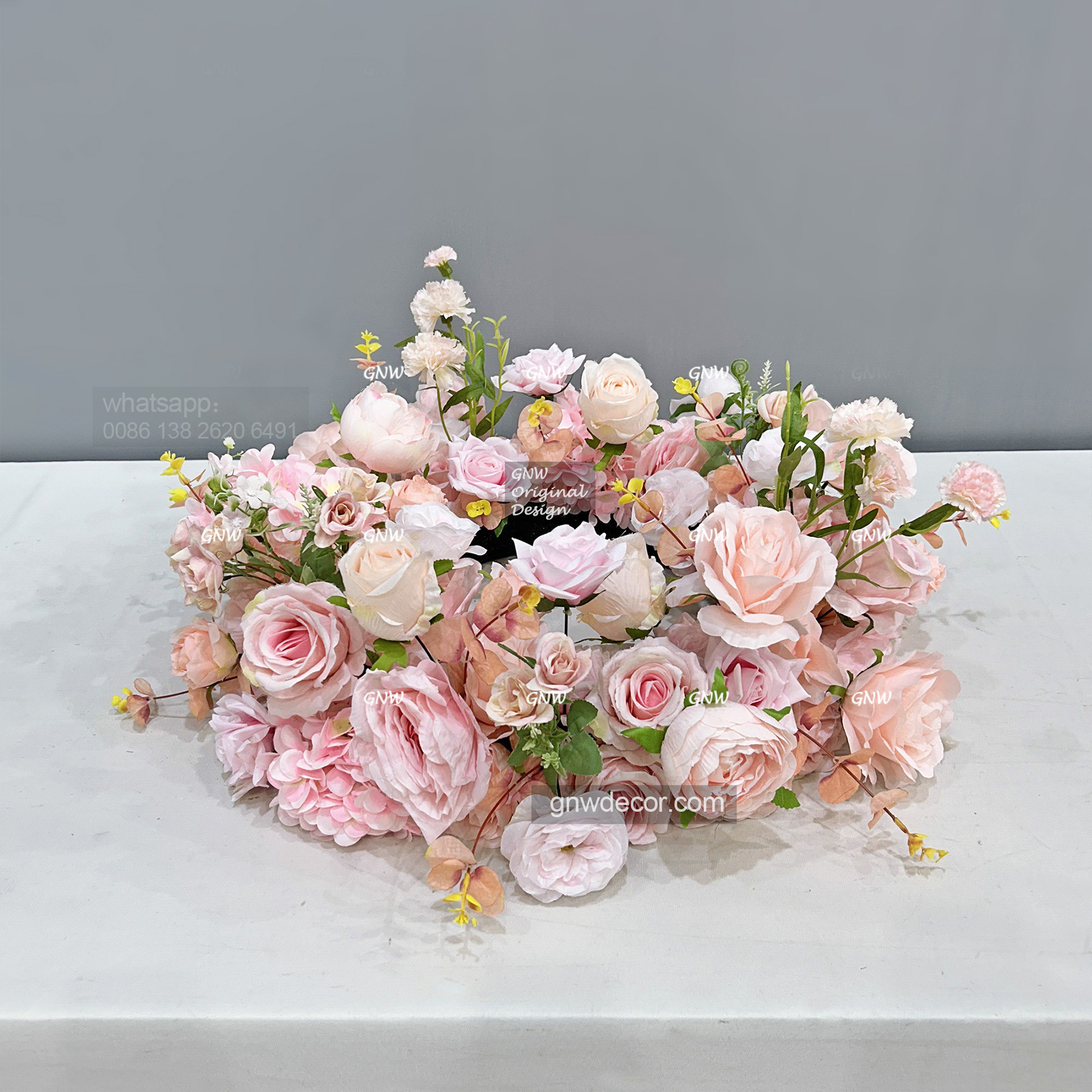 Artificial flower wreath