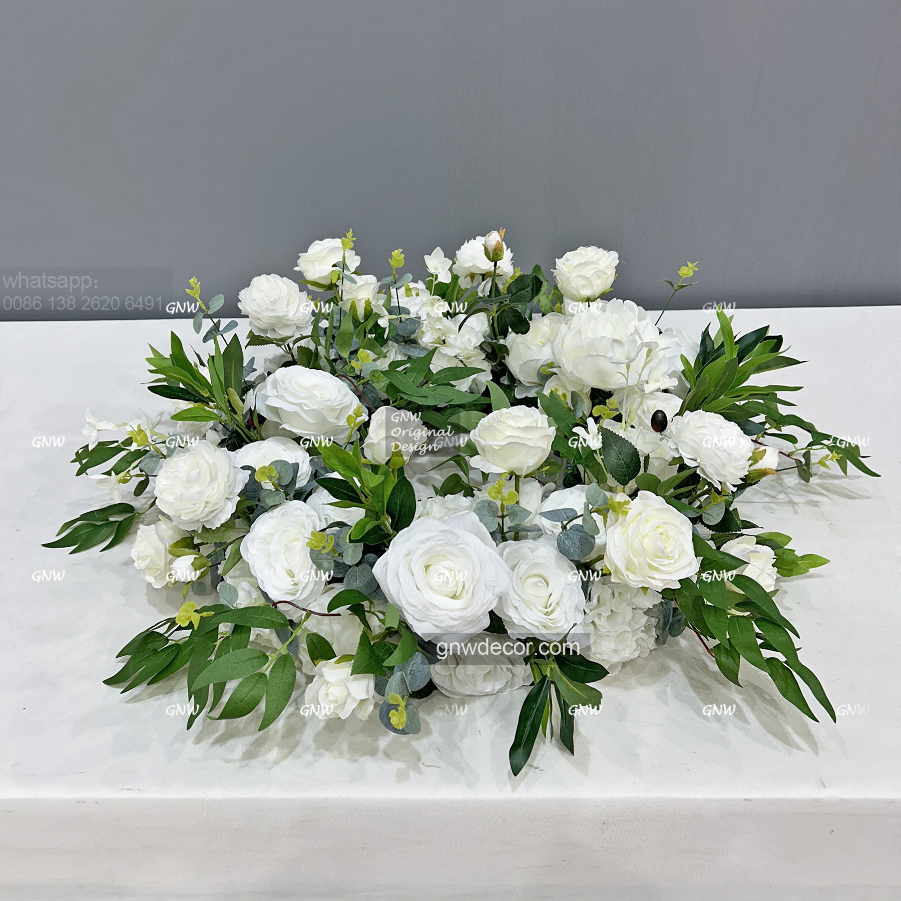 Artificial flower wreath