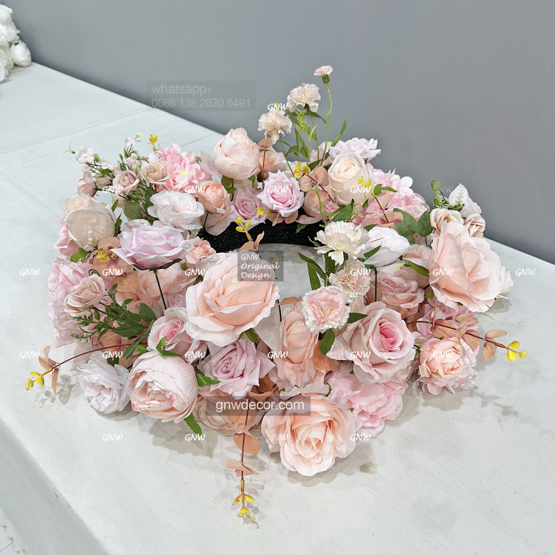 Artificial flower wreath