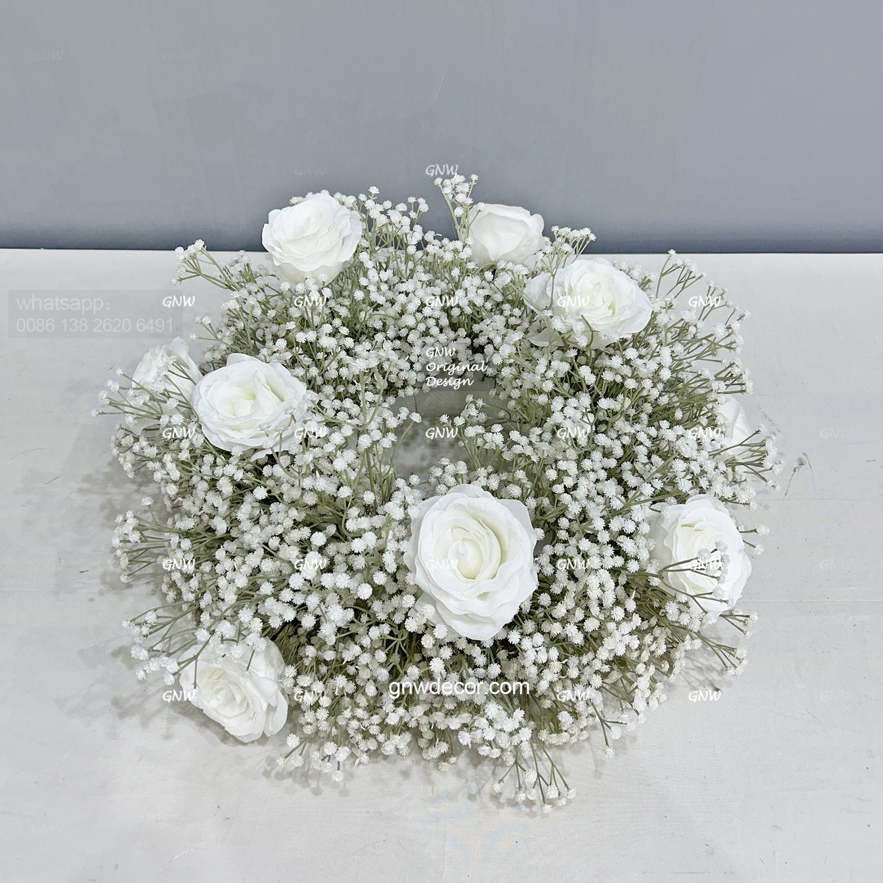 Artificial flower wreath