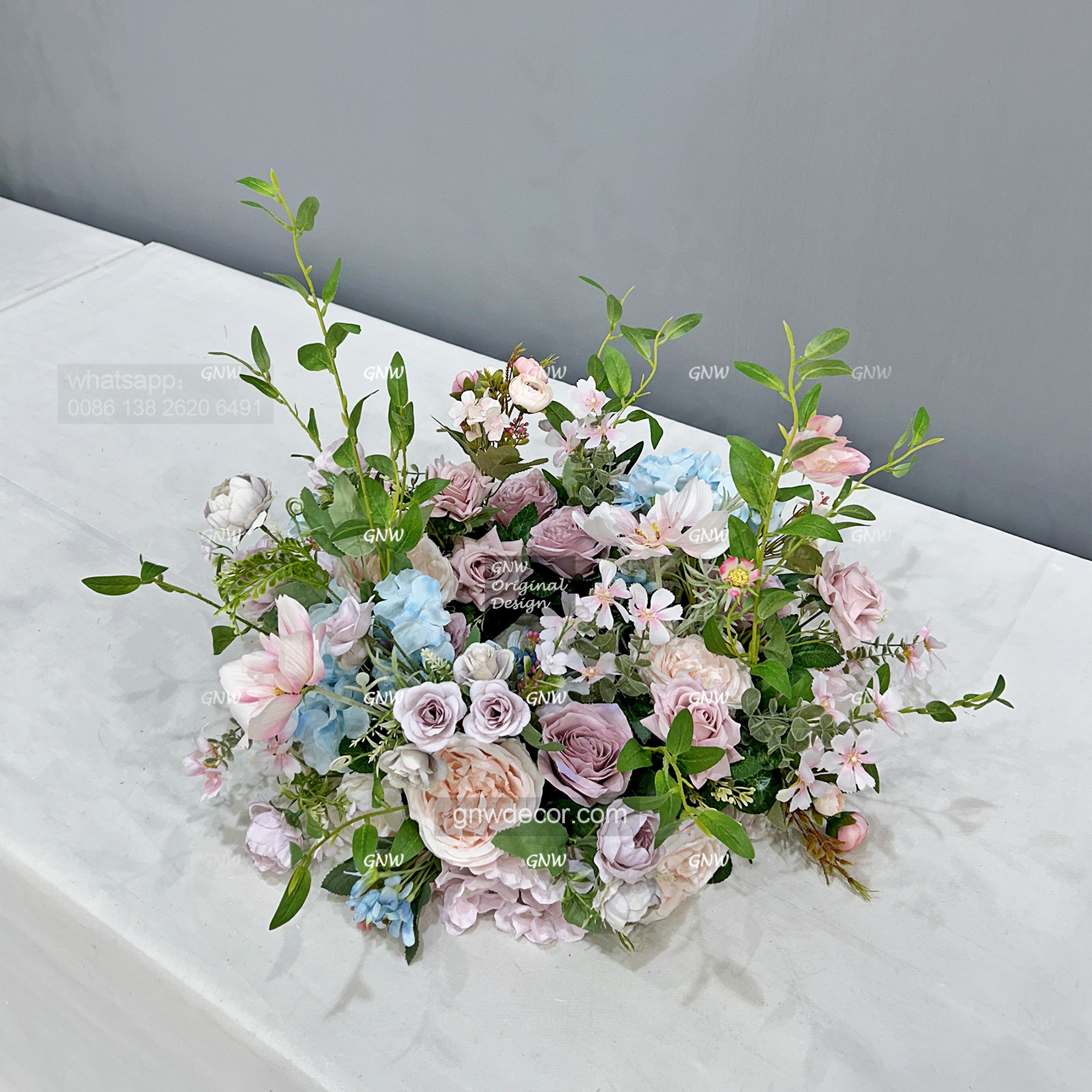Artificial flower wreath