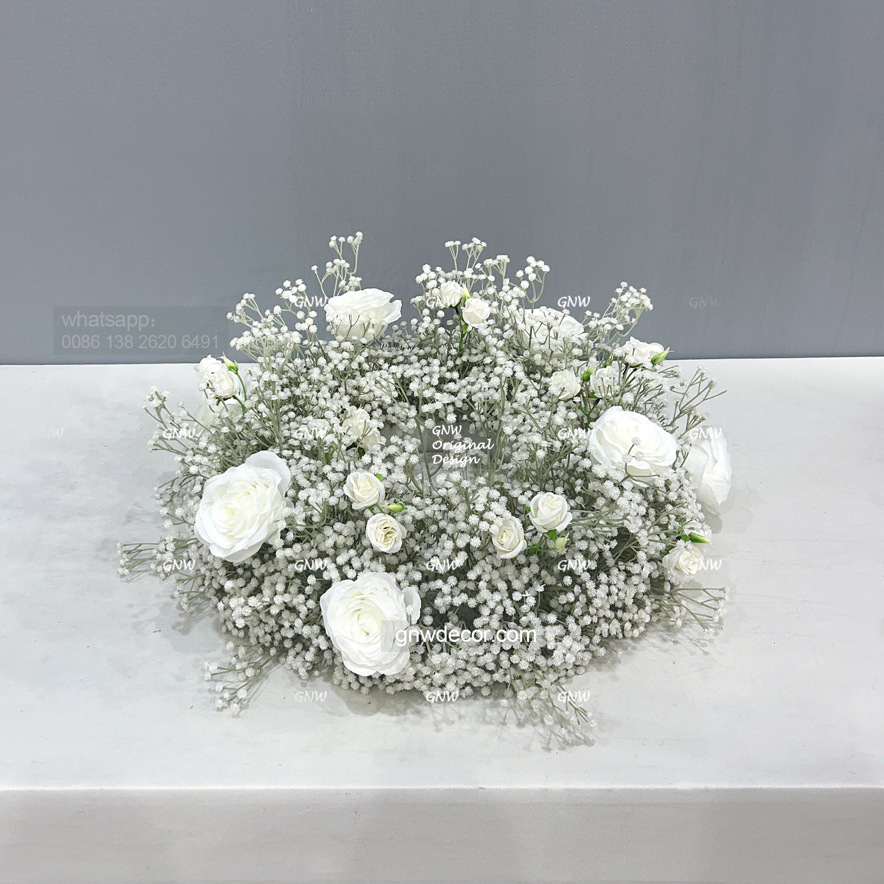 Artificial flower wreath