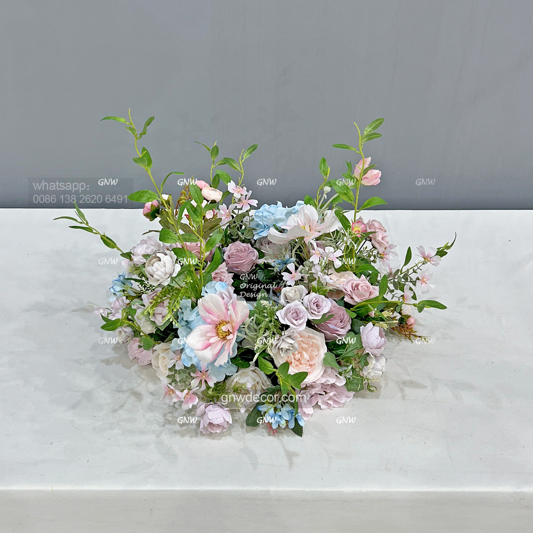 Artificial flower wreath