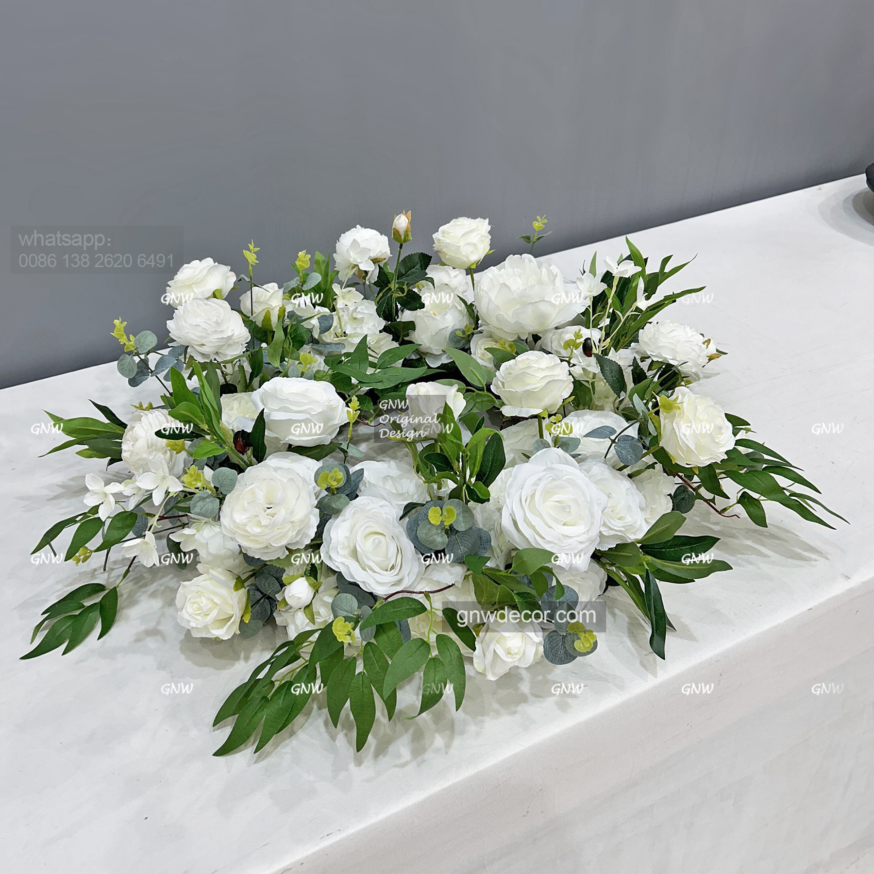 Artificial flower wreath
