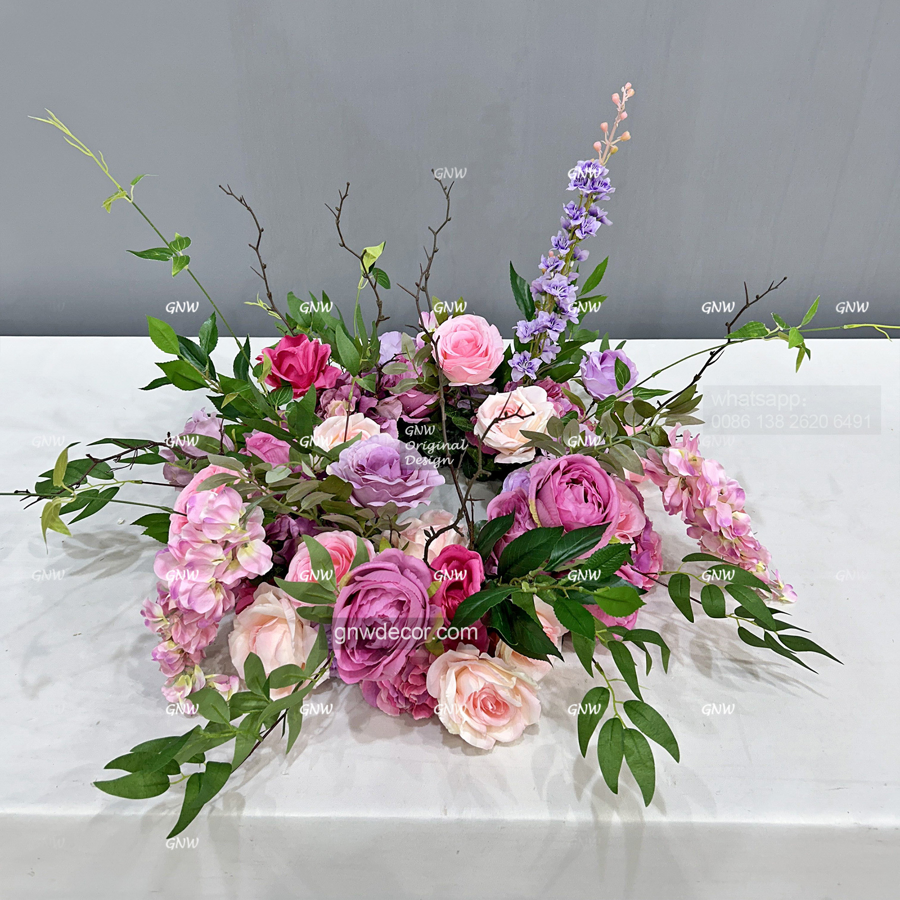 Artificial flower wreath