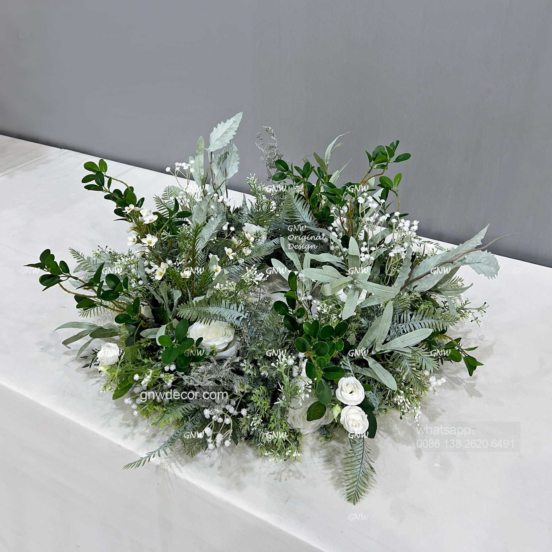 Artificial flower wreath