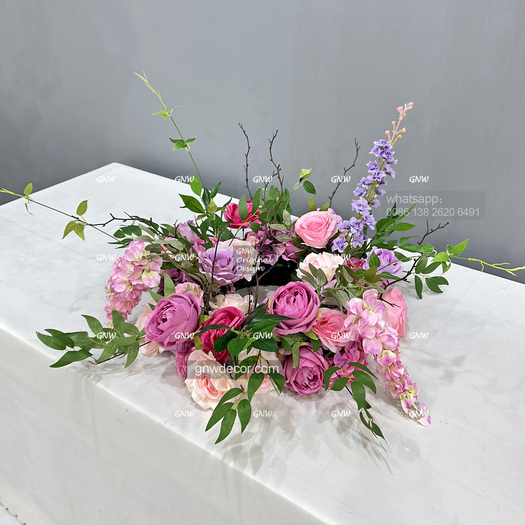Artificial flower wreath