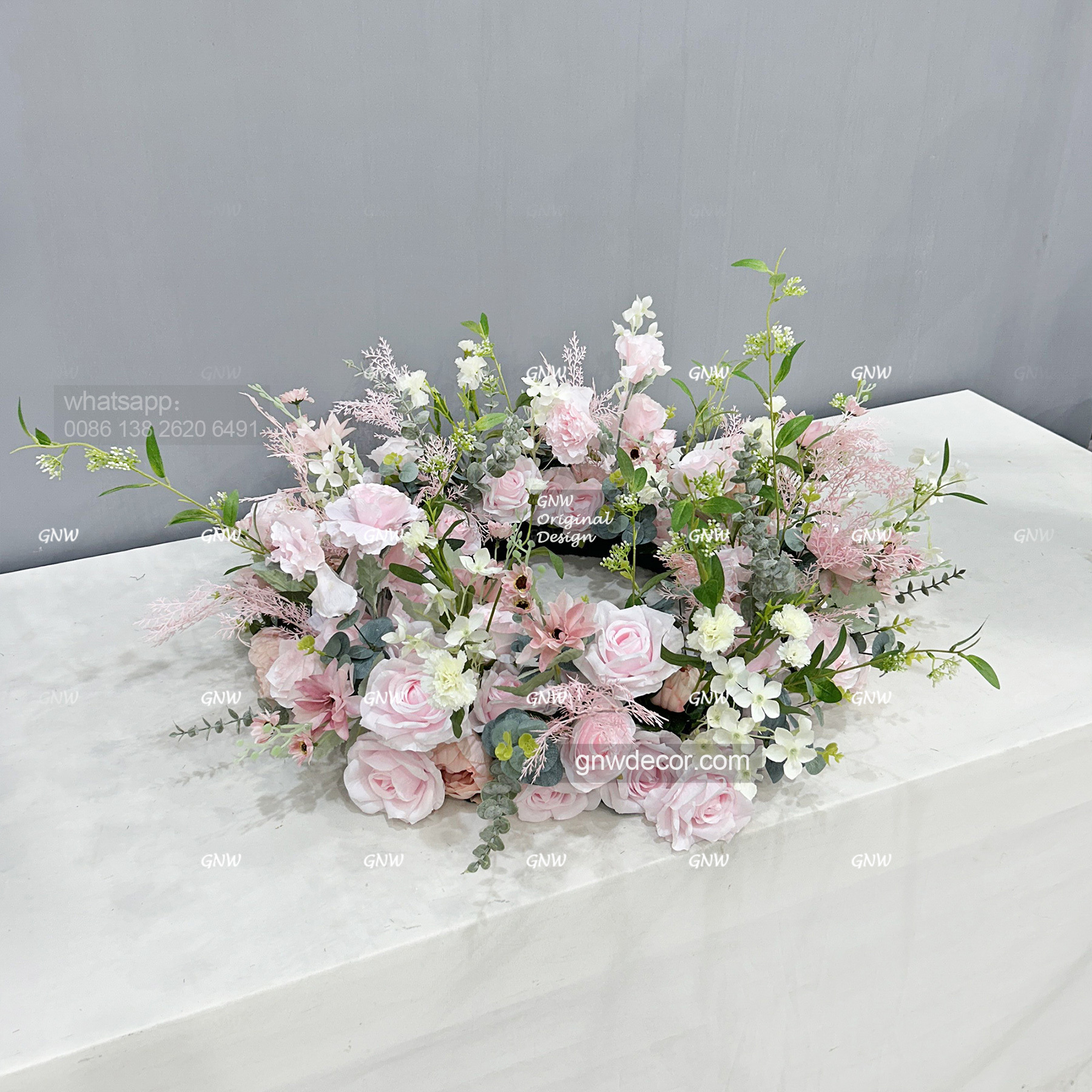 Artificial flower wreath
