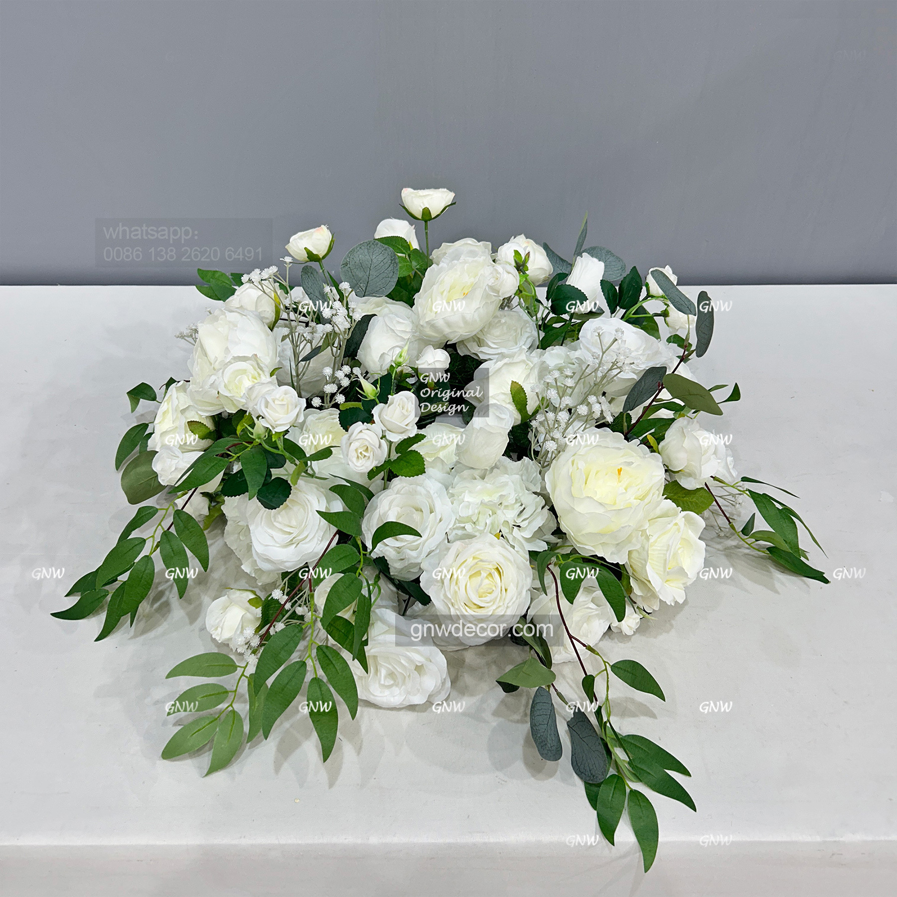 Artificial flower wreath