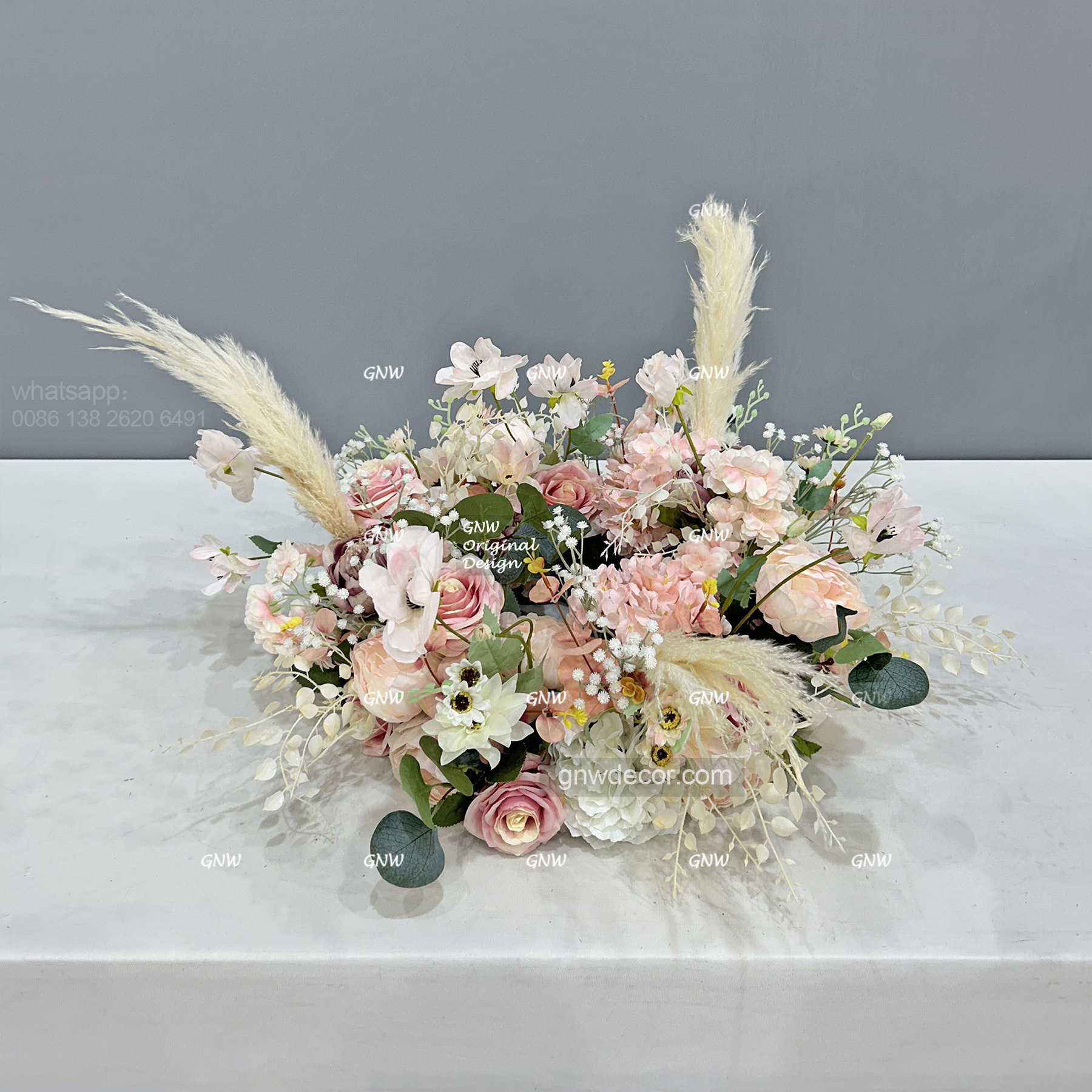 Artificial flower wreath