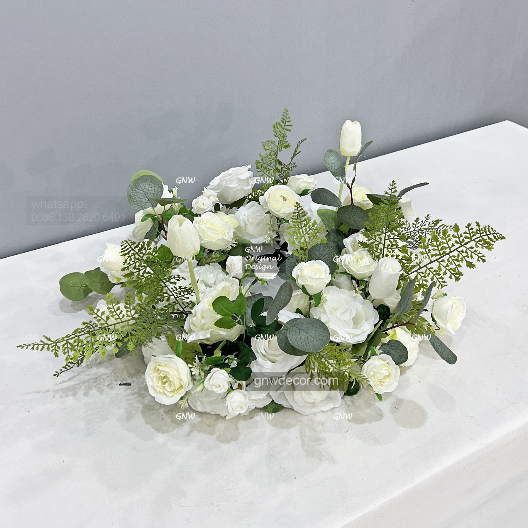 Artificial flower wreath
