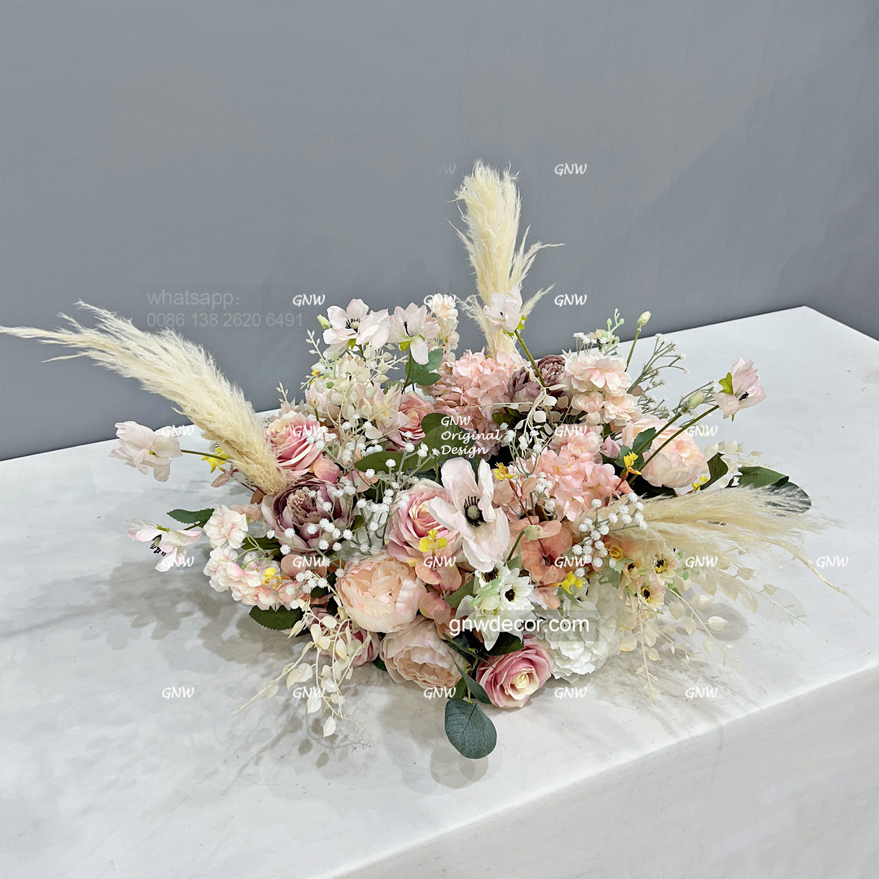 Artificial flower wreath