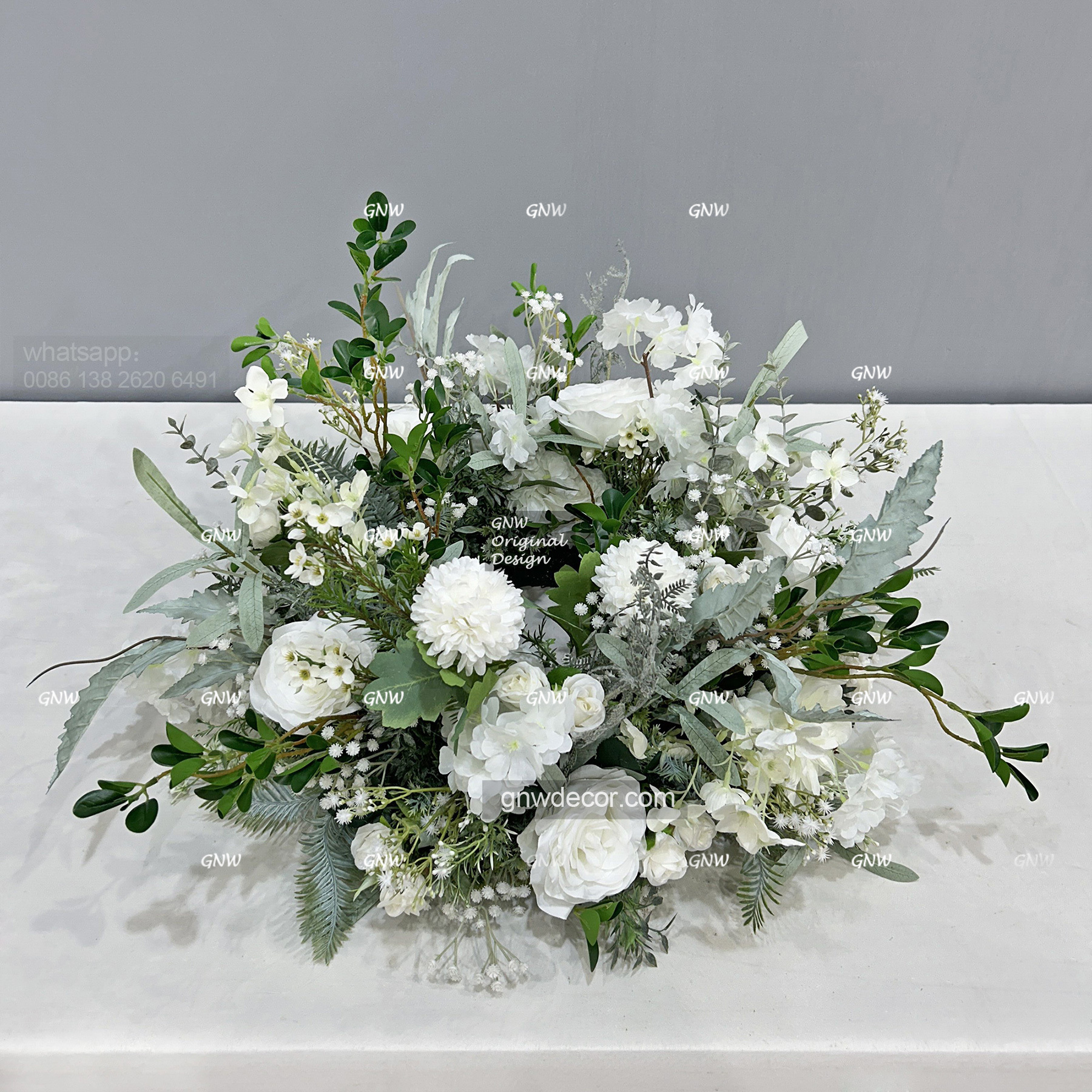 Artificial flower wreath
