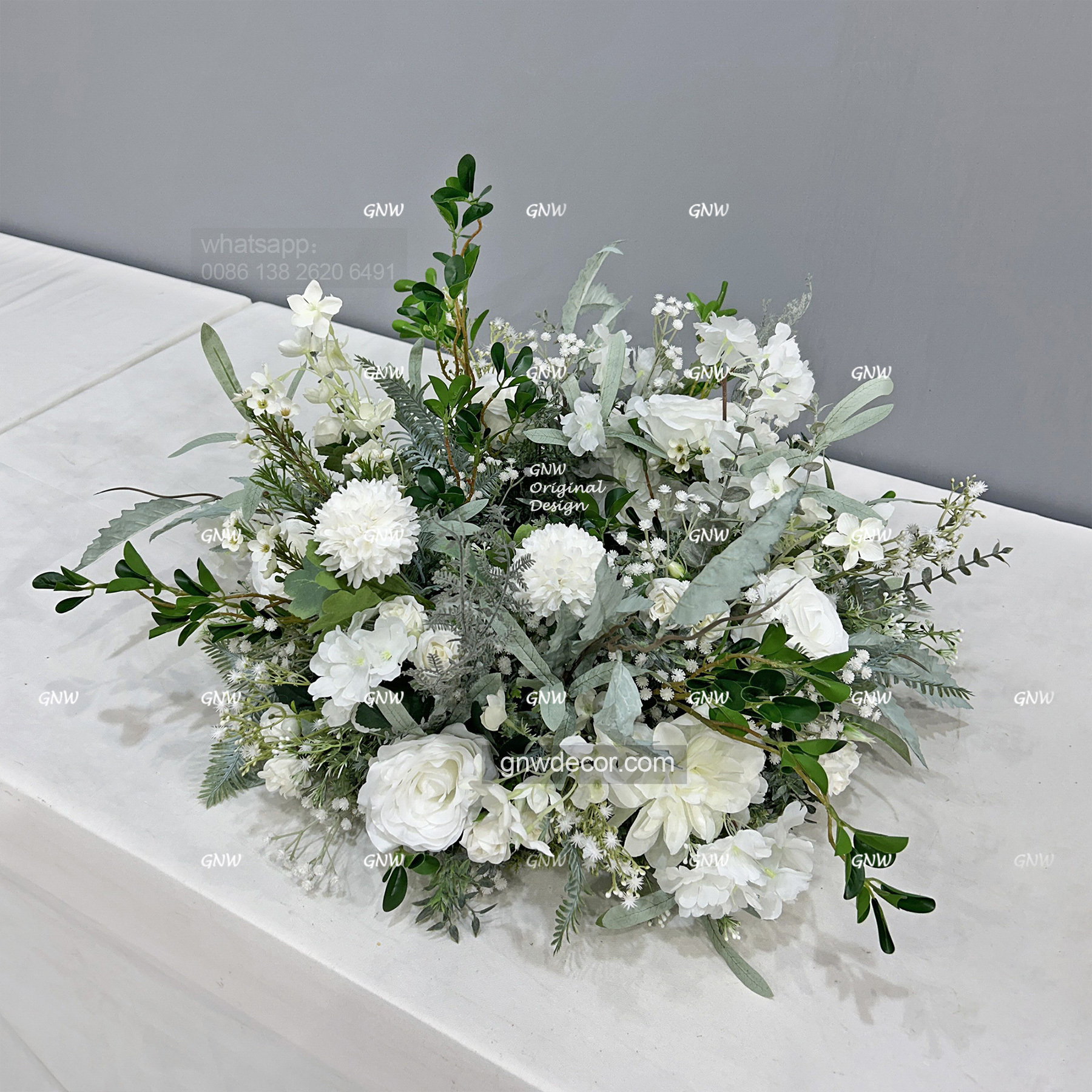 Artificial flower wreath